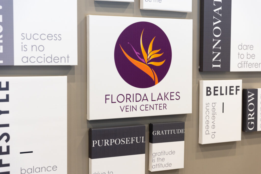 Florida Lakes Vein Center logo on a wall in the offices where patients go for vein disease treatment in Lakewood Ranch.